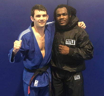 Coach Denis Kelly with Sokoudjou